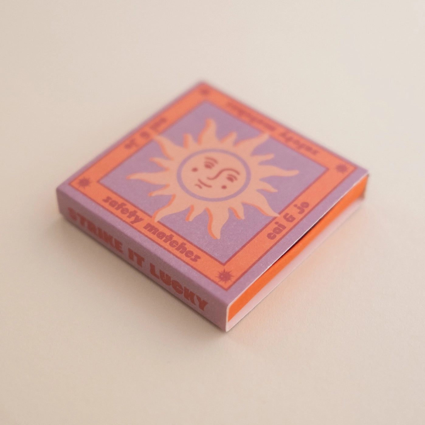 cai & jo Lilac Sun – designové zápalky v krabičce